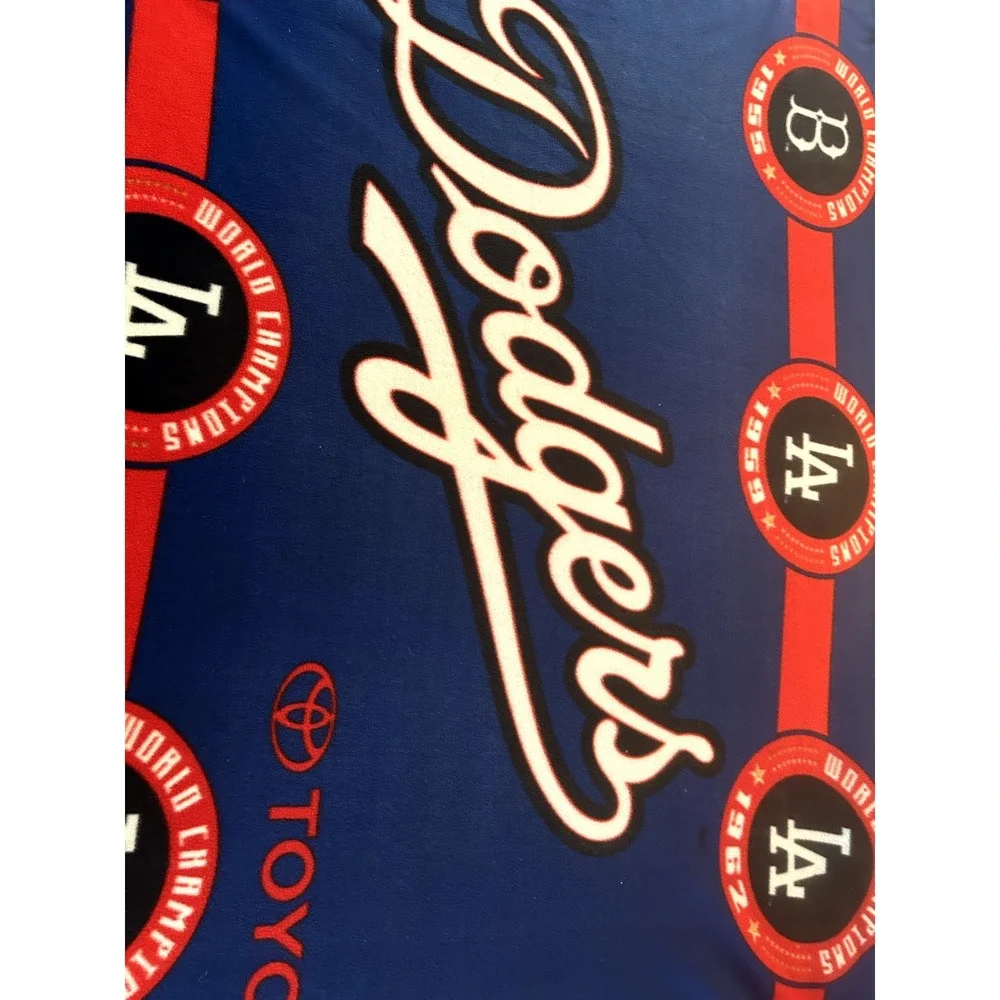 LA Dodgers blanket with logo and list of world series champioships‎